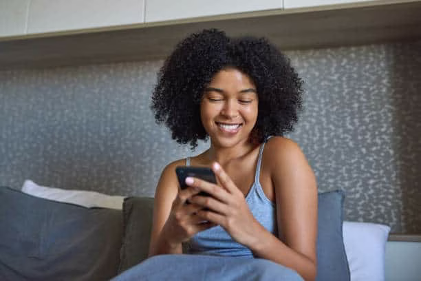 woman smiling at text